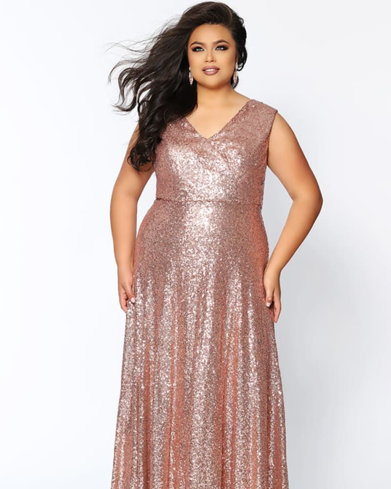 Front of a model wearing a size 14 City Lights Formal Gown in Rose Gold by Celebrations by Sydney's Closet. | dia_product_style_image_id:280039